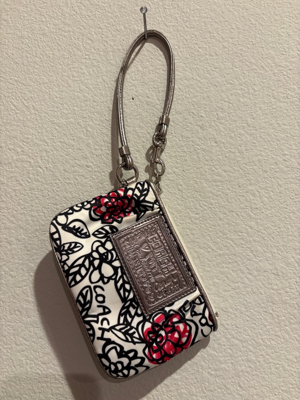 Coach White Floral Wristlet with Red & Black Accents